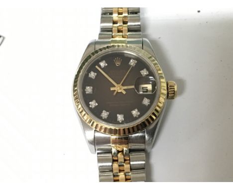 A Quality Ladies Rolex Oyster Perpetual DateJust Superlative Chronometer, with bi metal 18ct Gold case and bracelet and diamo