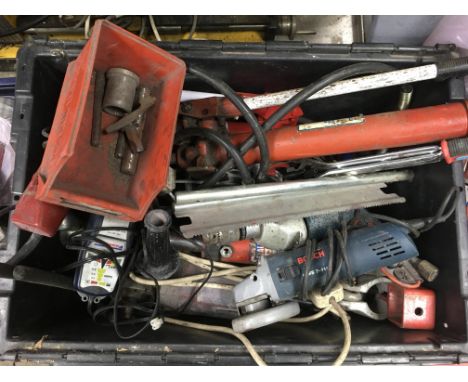 A large crate containing a collection of hand tools including grinders, strong arm, etc(untested)