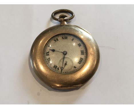 A Vintage 9ct Gold button wind pocket watch with a wide gold outer rim. Not working diameter of case 45mm. Weight 45g.