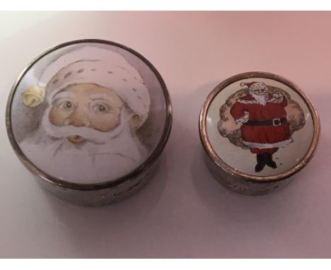 Two silver and enamel festive design boxes ( one @ 4cm diameter and one @ 3cm diameter approx)