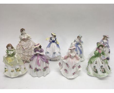 A collection of eight Royal Worcester fIgures