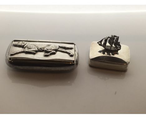 A silver snuff box with a dog design and one with a ship (2)