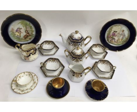 A Japanese Noritake gilded teaset, a pair of blue ground plates decorated with 18th Century figures, a Royal Worcester blue g