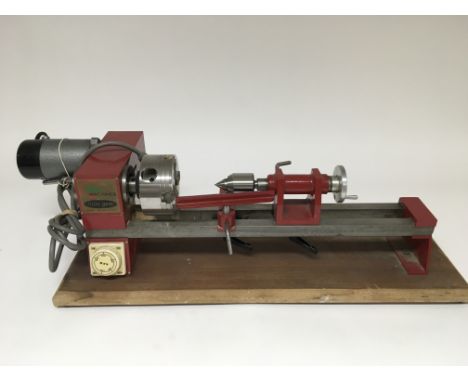 A 'Little Gem' hobby lathe by Tyme Machines plus other tools.