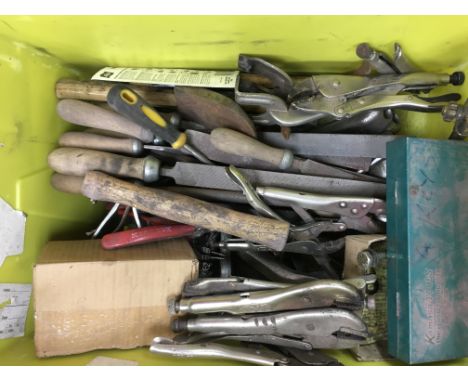 A box containing a large collection of tools including files, mole grips, panel beating hammers etc