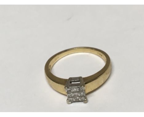 A Ladies 18ct Gold ring set with princess cut diamonds in a square. .25 carat Ring size P.