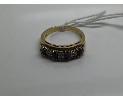 A 18 ct gold ruby and diamond ring size p