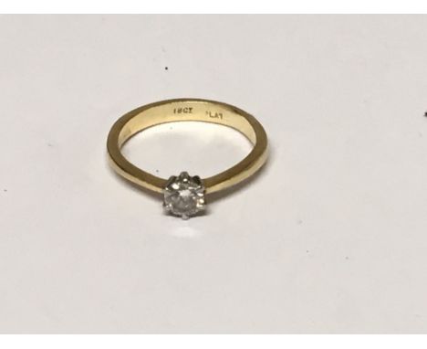 An 18ct yellow gold ring set with a solitaire diamond approximately.33 carat, ring size L