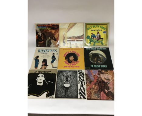 A collection of circa 1960's/70's vinyl LP records by various artists including The Ronettes, Lou Reed, The Rolling Stones, P