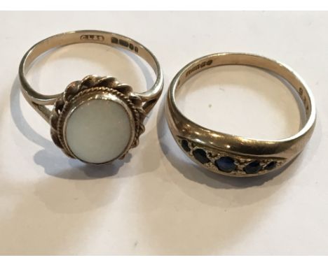 A 9ct Gold ring set with a row of Sapphires and one other ring set with an opal. (2)