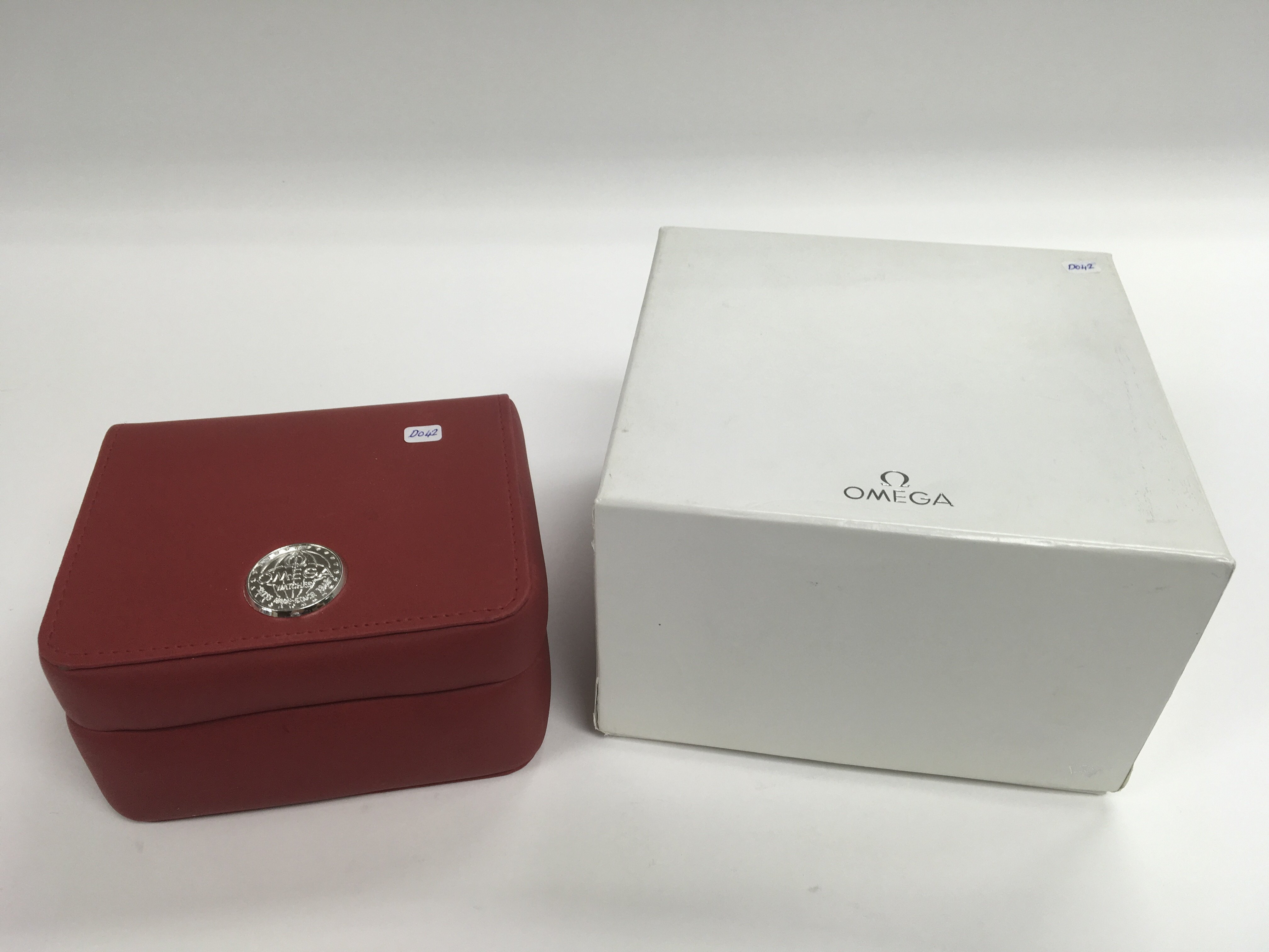 Two Omega watch boxes.
