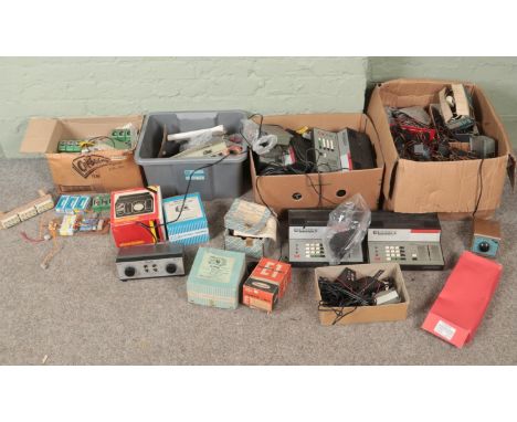 Four boxes of model railway electronics. Includes Marklin, Fleischmann, Hornby Zero 1 Master Control Units, etc.  