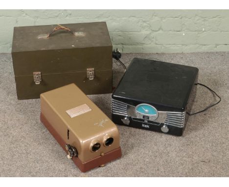 A "The Hawk Mk. V Stereoscopic Projector" together with Itek CD &amp; Record player.  