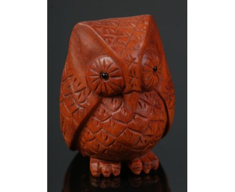 A hand carved hardwood netsuke of an owl  