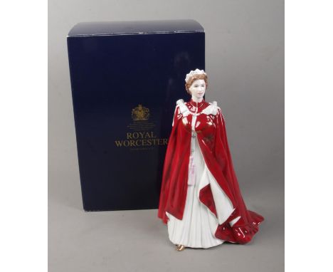 A boxed Royal Worcester figure of Queen Elizabeth II titled In Celebration of the Queen's 80th Birthday 2006: Dressed in the 