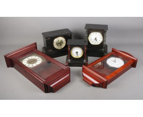 A quantity of mantel and wall clocks including a Wm. Widdop black slate and marble mantle clock featuring roman numeral dial 