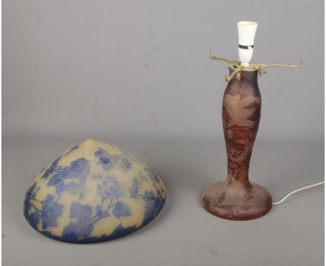 Two pieces of coloured table lamp glass to include lamp base and shade both in the manner of Emile Galle. Both of floral desi