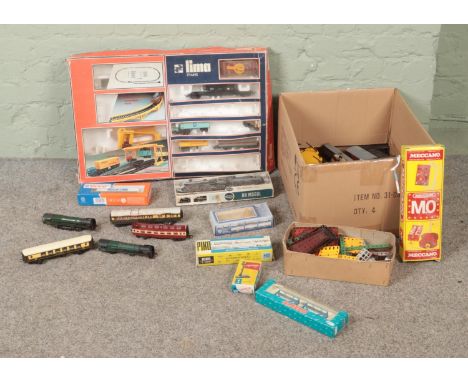 A box of assorted model railway rolling stock and small selection of Meccano to include Fleischmann, Piko, Airfix, Roco, etc.