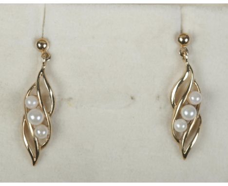 A pair of 9ct gold and pearl drop earrings.  