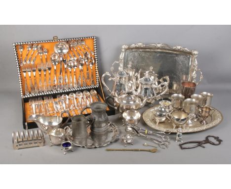 A quantity of metalwares including Super Inox cutlery set, silver plate trays, teapots, jugs, tongs, goblets etc  