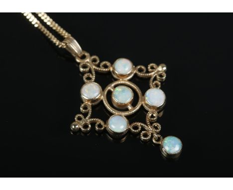 A 9ct Gold and six stone opal droplet pendant, set on 9ct Gold chain. Total weight: 5.2g.  