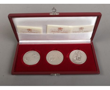 A set of three sterling silver coins from the Vatican Museum commemorating Michelangelo.  