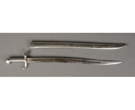 An 1842 pattern Chassepot bayonet with scabbard and engraving to top edge of blade. Handle has been plated. CANNOT POST OVERS