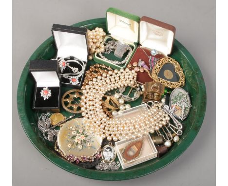 A tray of costume jewellery. Includes compact, simulated pearl collar, Swarovski etc.  