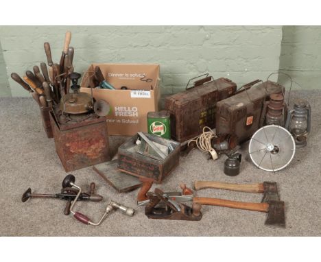 A collection of assorted tools and lamps to include S.H&amp;S camping stove, chisels, ammo crates, planes, etc.  