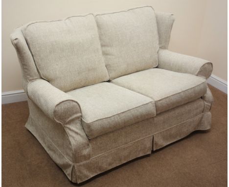 Heirloom Furniture two seat sofa, upholstered in loose natural covers (W153cm) a matching armchair (W99cm) and footstool (W64