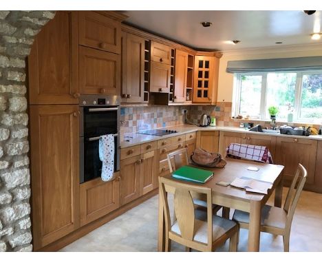 Complete Practical Kitchen area with solid light oak patina doors and facias, including five double and one single base unit,