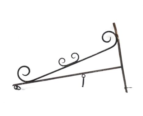 Wrought metal wall mounted bracket for hanging sign/basket, decorated with scroll work, L109cm Condition Report Click here fo