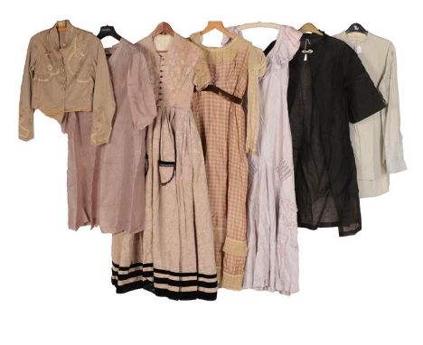 Early 20th Century Costume, comprising a lady's dark cream silk dress woven with floral motifs, patch pockets to the front an