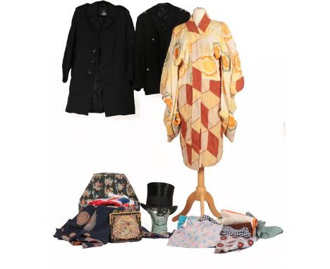 Assorted 20th Century Costume Accessories, comprising 1950s and later cotton aprons; a black Police jacket with two embroider