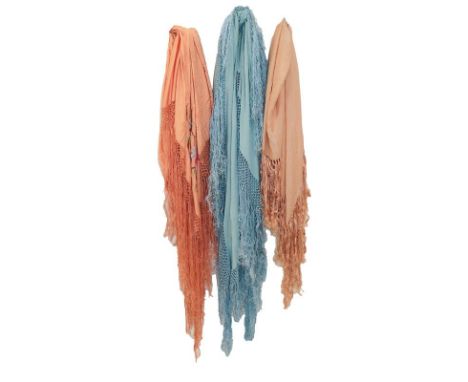 Early 20th Century Silk Shawls, including a pale blue example; peach silk shawl; darker peach silk shawl with coloured floral