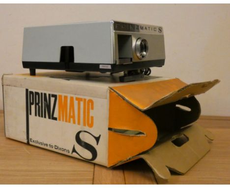 An Eumig 820 Sonomatic sound projector, a Prinzmatic slide projector, a Paximat Triumph slide projector (boxed), a slide proj