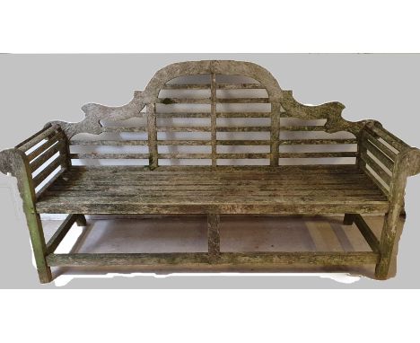 A hardwood garden bench with scroll arms, 197 cm and another bench, (one leg shorter) 