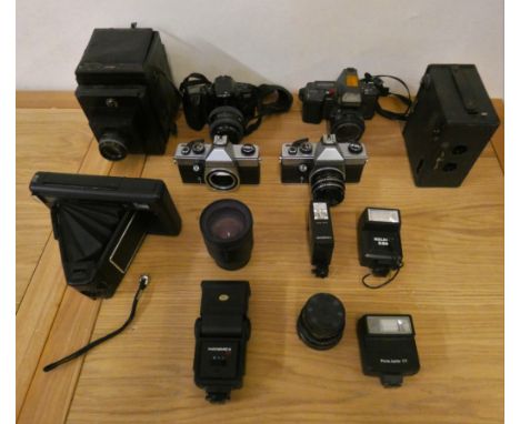 A collection of camera's, Victory Reflex, Praktica and a Bell &amp; Howell cine camera, together with various accessories (2)