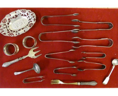 An 830 standard silver cast silver pin dish, a silver sugar sifter spoon, Sheffield 1901, and other silver and plated wares. 