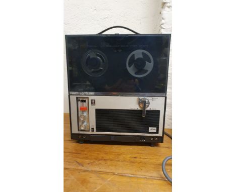 A Toshiba tape recorder, GT 601-V vertical 5, a Dynatron record player with Garrard deck, a Fidelity HF 43 record player, a P
