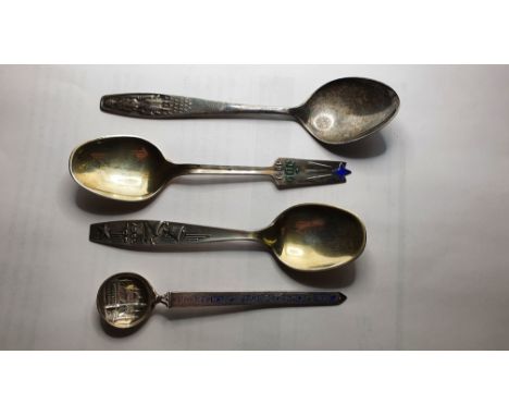 Nils Hansen, a Norwegian silver spoon, two Year spoons and an Egyptian spoon.