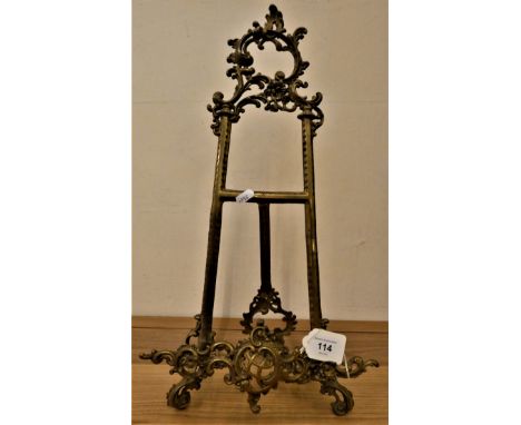 A brass easel, 54 cm. 