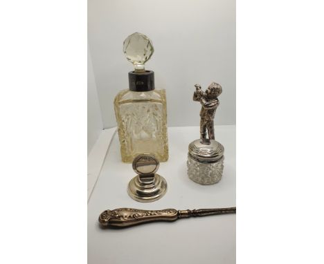 A sterling silver menu holder, a silver mounted glass scent bottle, London 1943 and three other items.