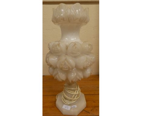 A facetted glass and brass table lamp, 55 cm, a carved quartz floral lamp, 48 cm and two other lamps (4). 