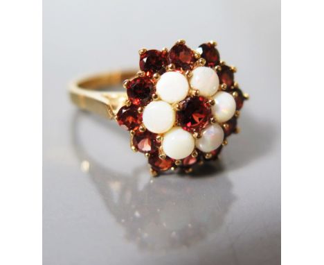 A 9 ct Gold Opal and Garnet Cluster Ring, size O, 4 g