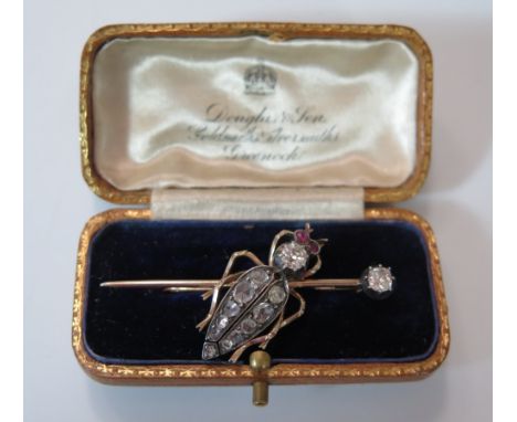 A Ruby and Diamond Insect Brooch, largest stone c. .4 ct, 5 cm long, 5.8 g