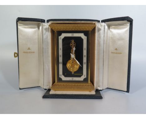A Jaeger LeCoultre Eight Day In-line Skeleton Desk Clock in original numbered fitted box, base stamped 502