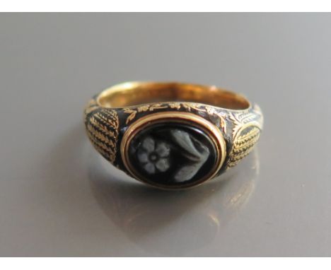 A Victorian Enamel Ring set with stone cameo decorated with a forget-me-not and engraved '... Lady Kelly...1851', size M.5, 6