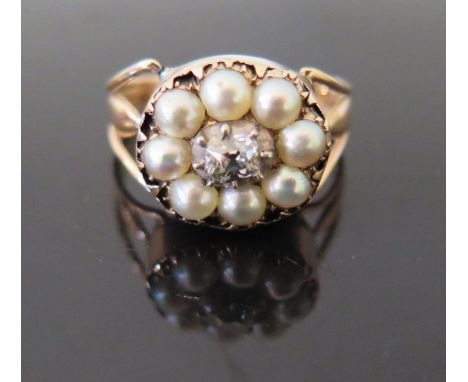 A Georgian Old Cut Diamond and Pearl Memorial ring inscribed 'Catherine? Holland, died 15th Jan 1805', size R.5, 5.4 g