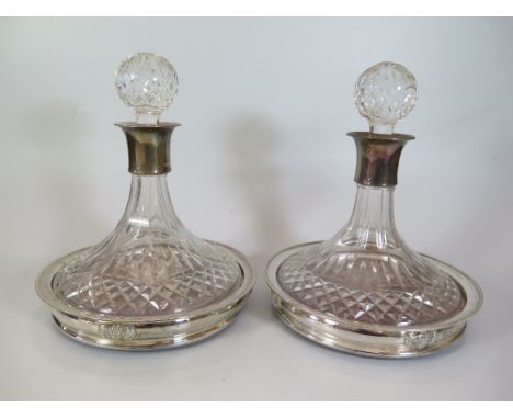 A Matched Pair of Elizabeth II Silver Ship's Decanter Coasters, one Birmingham 1976, Garrard & Co. Ltd. (inscribed) with matc
